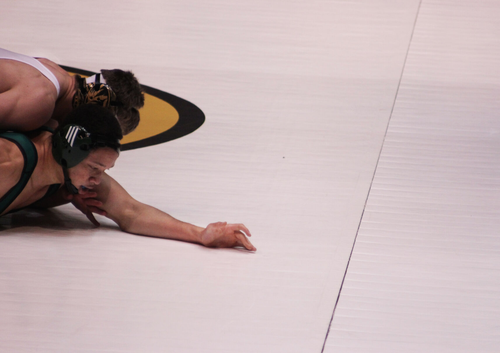 Rocky Elam attempts to take down Jordan Greer